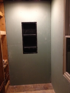 Wall number 3 with tile-ready shower shelves! Nothing to bang your head on in this shower!